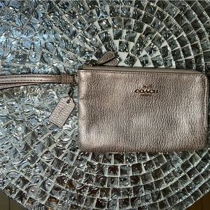 Metallic gold Coach double zipper wristlet